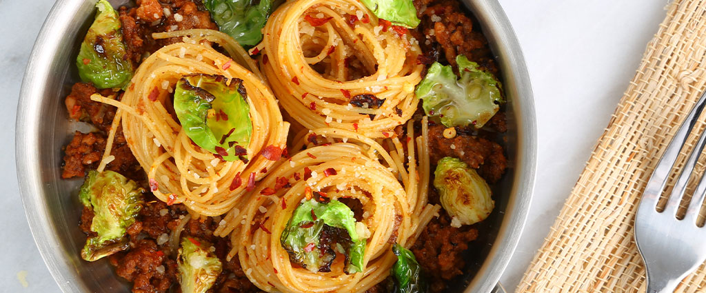 Thin Spaghetti with Spicy Sausage & Brussels Sprouts Sauce