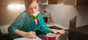 woman multitasking on computer
